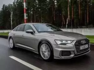 Audi A6 55 TFSI Quattro 2019 model year drives on the road