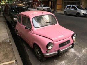 A Cute Fiat model 600 painted in pink color