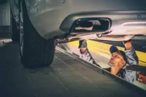 Car Diagnostic Technician Under the Vehicle