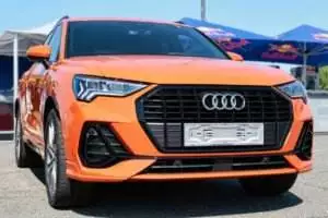 Orange car model 2019 Audi Q3